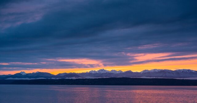 I was treated to a pretty incredible sunset view of the Olympic Mountains crossing the Hood Canal this evening